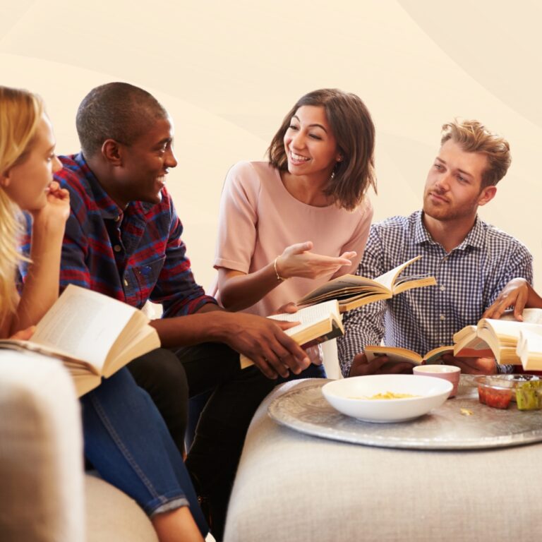 Diverse group of readers holding books in a circle