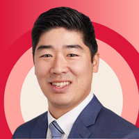 Dr. Brian Kim on a pink graphic background