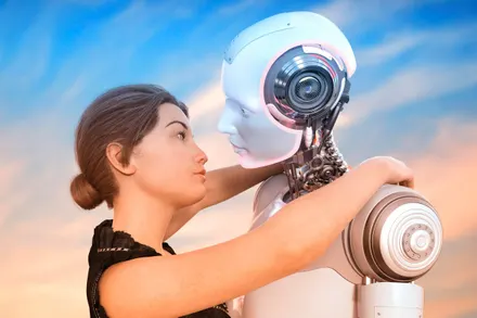 Robotic woman holding robot in romantic embrace